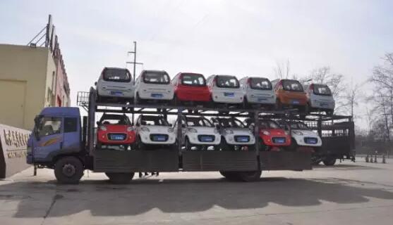 沐鸣2电动汽车批量发车湖南—共创低碳生活